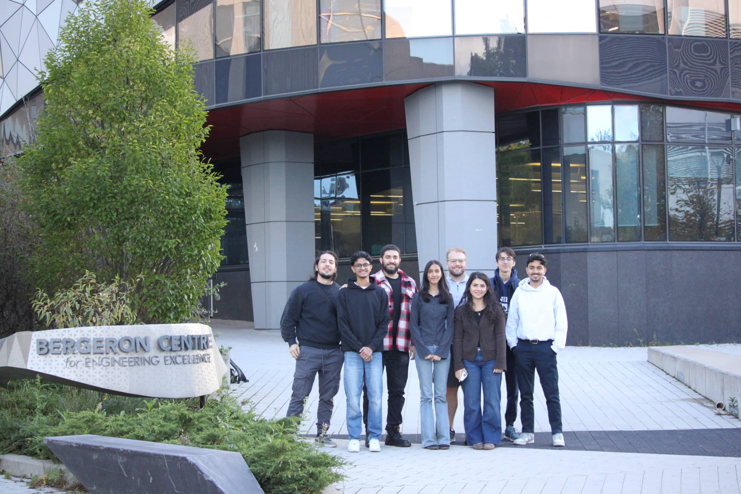 Group photo outside engineering building.